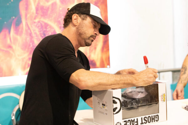 Skeet Ulrich signing Funko at Weekend of Hell